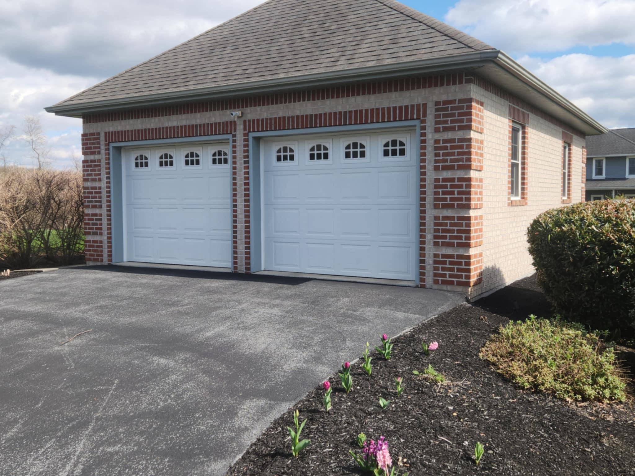 Beautiful brick garage installed by Rhinesmith Construction