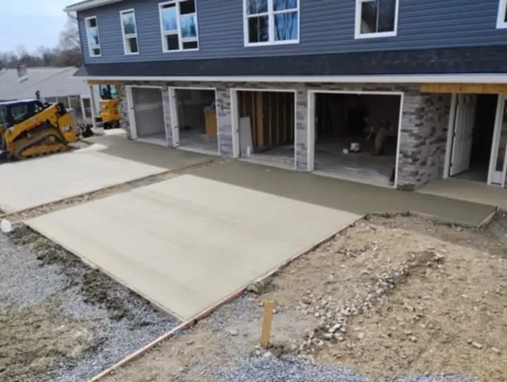Newly poured concrete driveway by Rhinesmith Construction