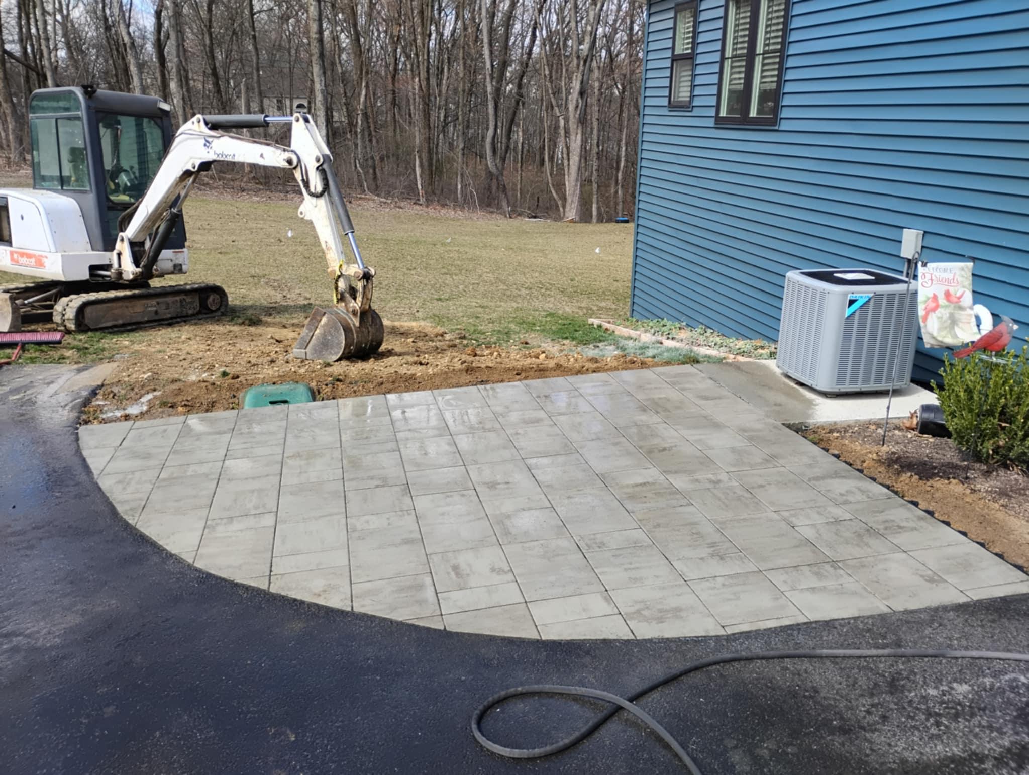 Beautiful paver patio installed by Rhinesmith Construction