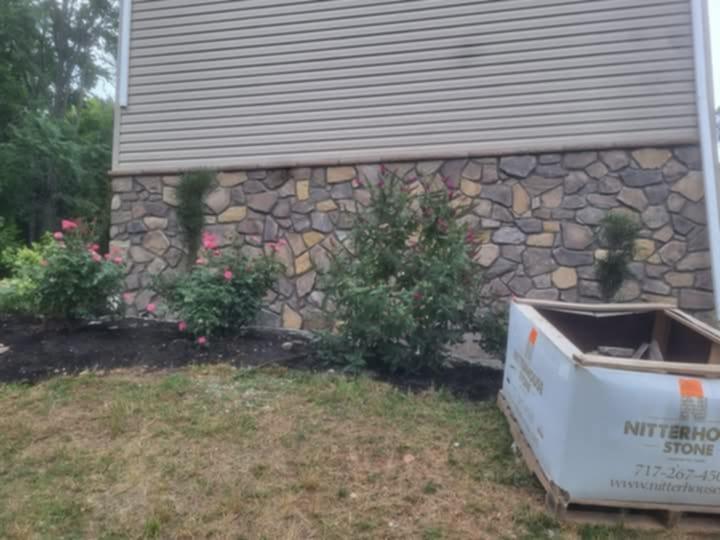 Beautiful stone veneer installed by Rhinesmith Construction
